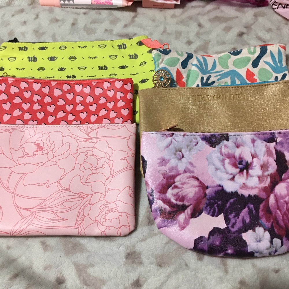 5 ipsy bags and 1 urban decay